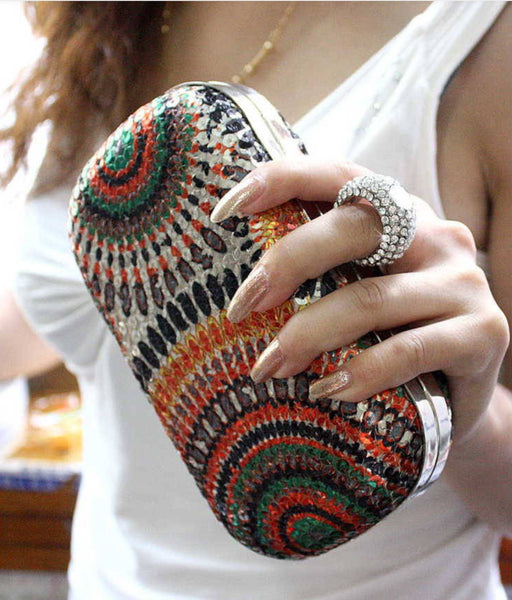Knuckle ring top clutch bag
